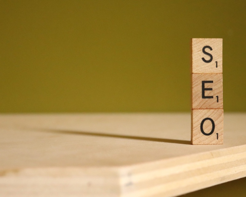 3 stacked scrabble tiles spelling out SEO