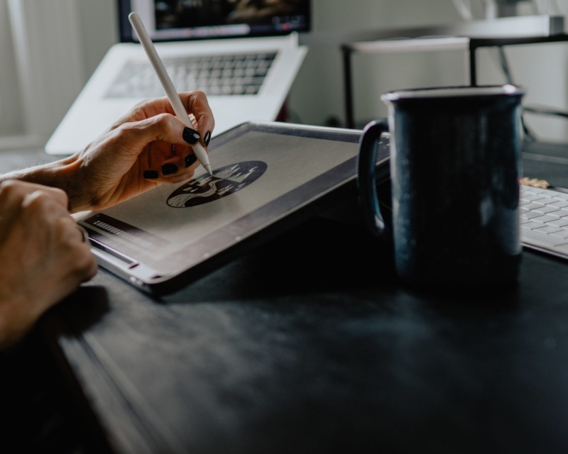 Graphic designer working on a logo