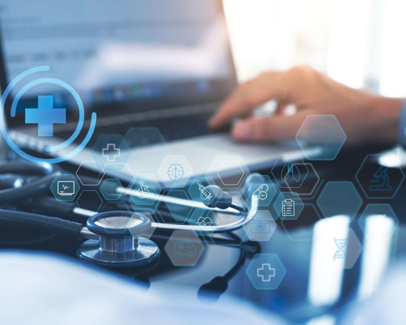 Doctor working on his computer