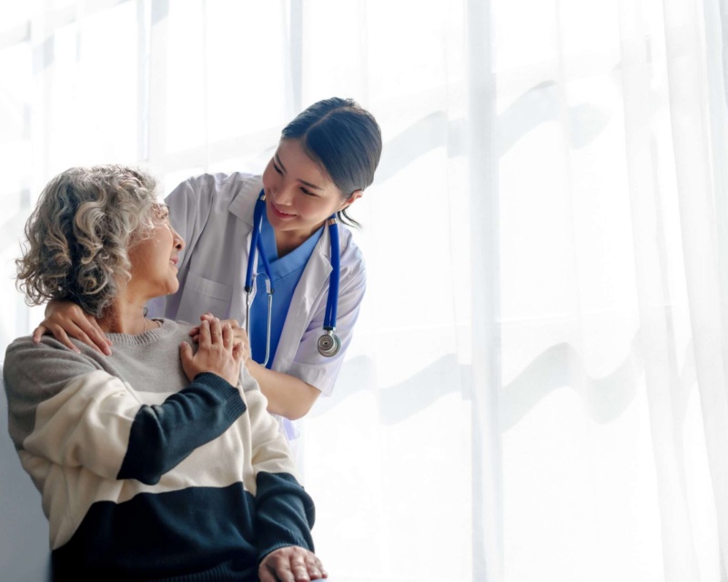 Doctor treating her patient