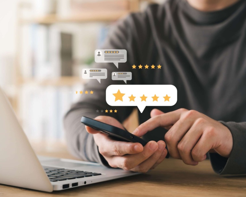 Someone on their phone rating a service