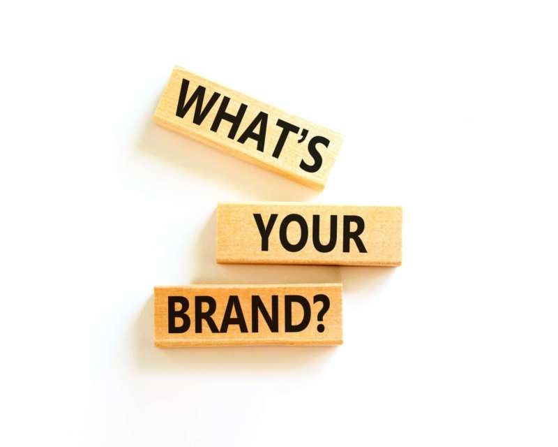 Wooden blocks stacked saying whats your brand?