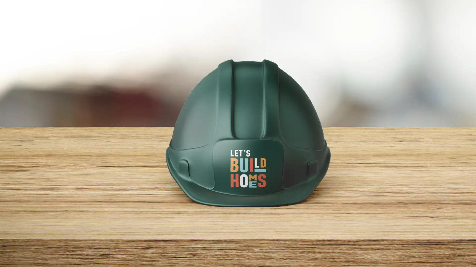Let's Build Homes logo on a construction hat