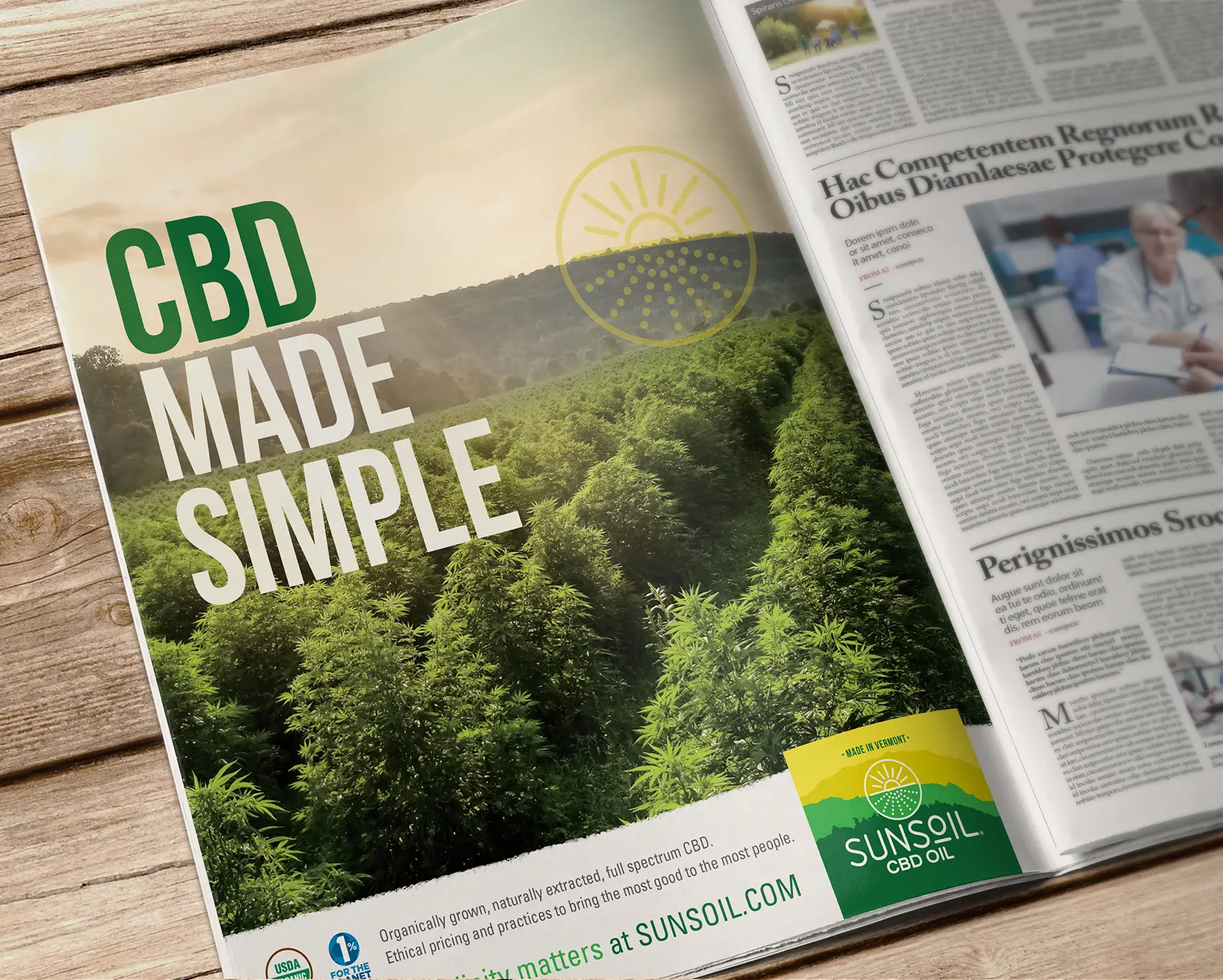 Open magazine or newspaper showing advertisement for Sunsoil CBD
