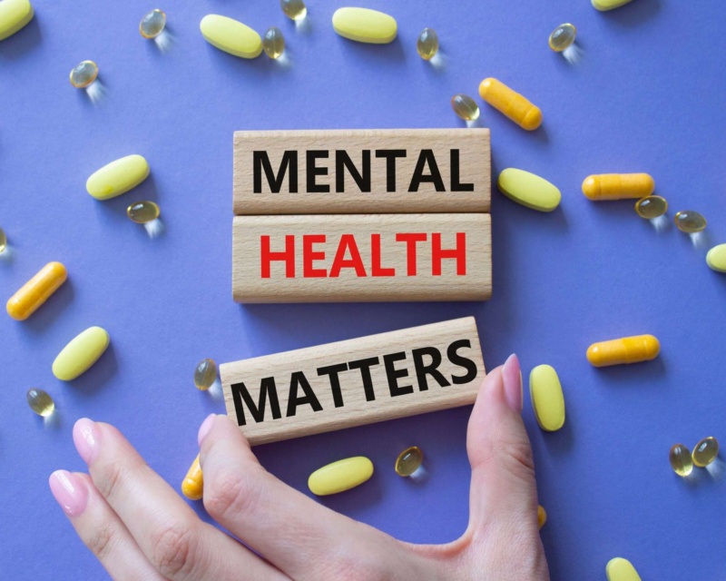 Building blocks that say mental health matters with medication around the bocks